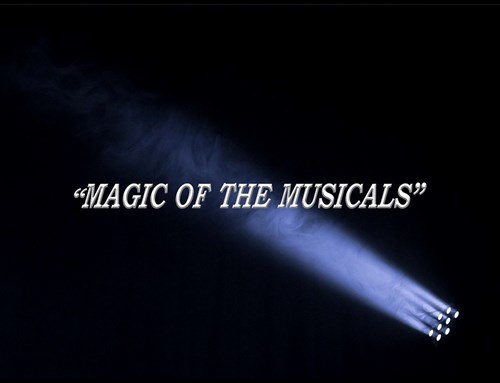 On a black background, in the light of a spotlight ,the title 'Magic of the Musicals' is in silver, bold lettering. 