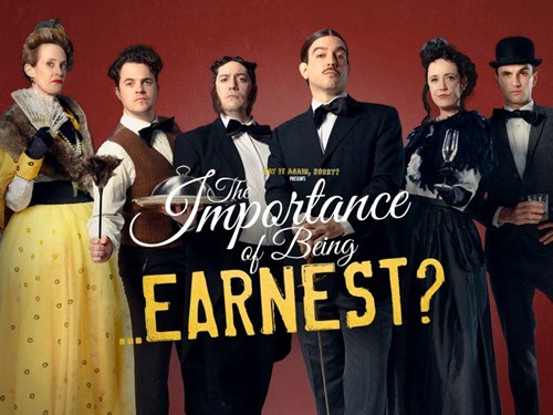 The cast of The Importance of Being...Earnest? are all dressed in Victorian-style clothes of smart, black suits and lavish dresses. 